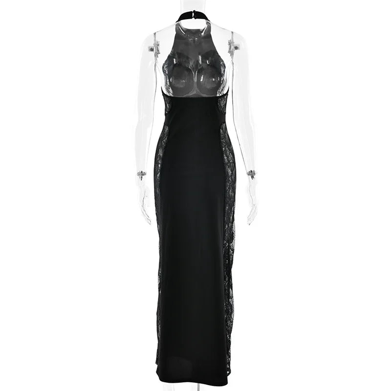 Black evening gown with sheer overlay on a white background