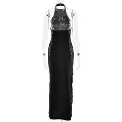 Black evening gown with sheer overlay on a white background