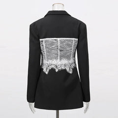 Black jacket with white lace detailing on a mannequin against a white background