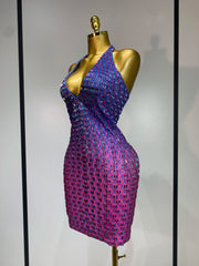 Side view of halter neck bodycon mini dress with crystal embellishments