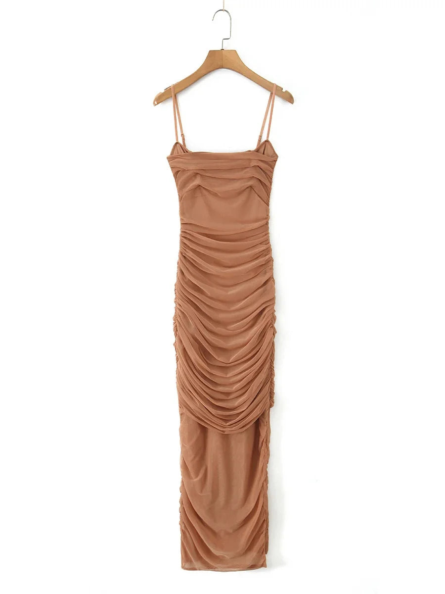 Brown dress on a hanger against a white background