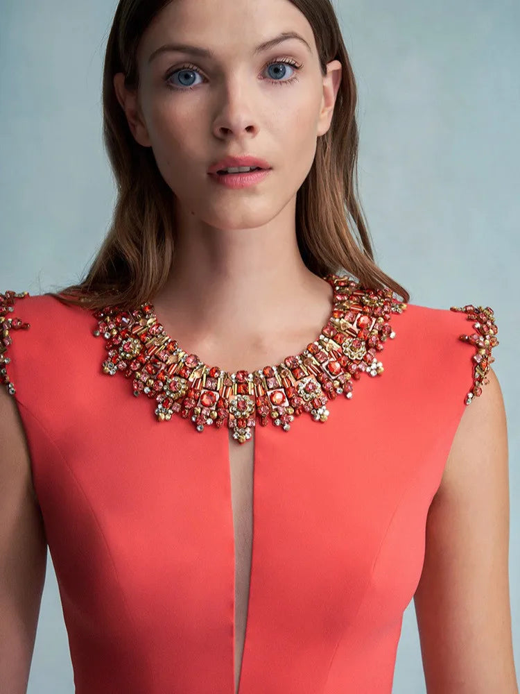 Beaded neckline cap sleeve mini dress on model