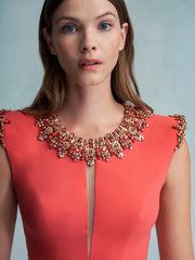 Beaded neckline cap sleeve mini dress on model