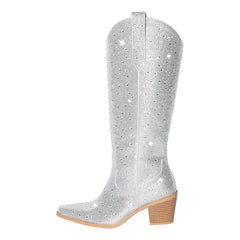 Silver glitter cowboy boot on a white background