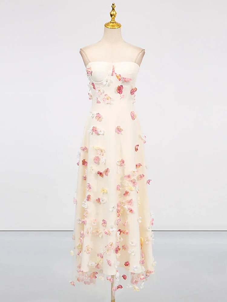 Floral dress on a mannequin against a white background