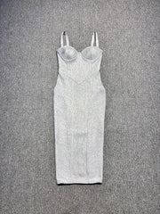 White ribbed dress with thin straps on a gray textured background