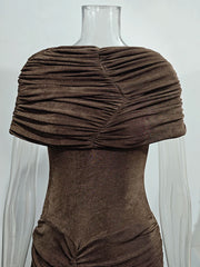 Brown pleated shrug on a mannequin against a white background