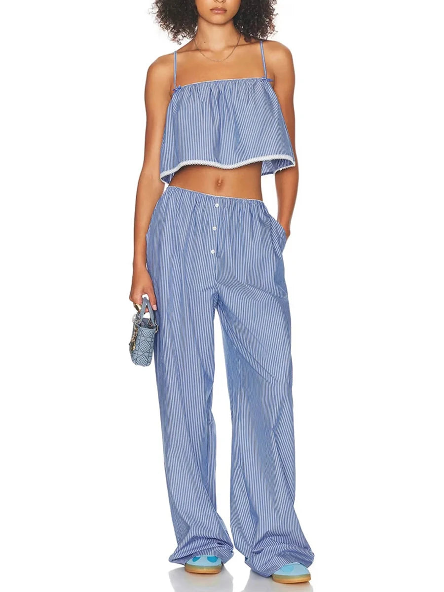 Woman wearing a blue striped outfit on a white background