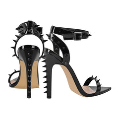 Pair of spiked stiletto pointed toe sandals