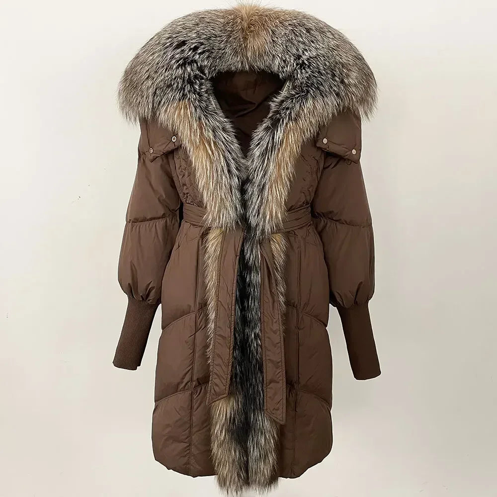 Brown winter coat with fur hood and trim on a white background