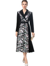 Velvet floral embroidered v-neck midi dress worn by a model