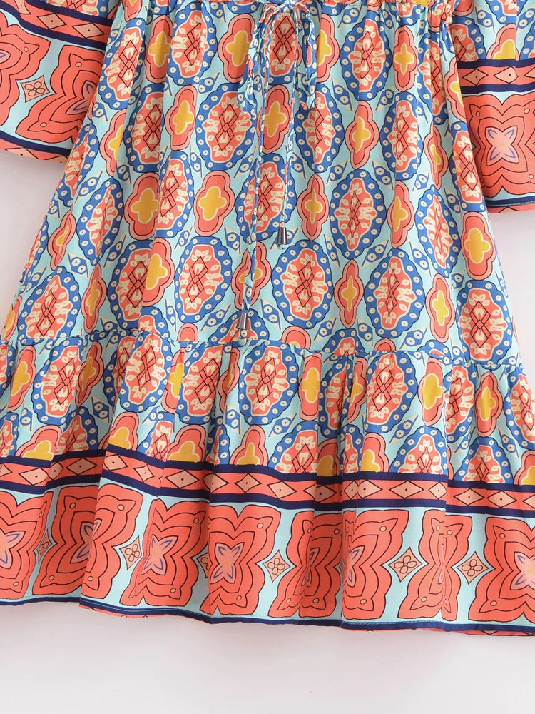 Close-up of the tiered hem on the mini dress