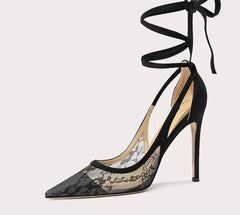 Black lace high-heeled shoe with tie-up design on a white background