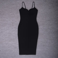 Black slip dress on a gray background