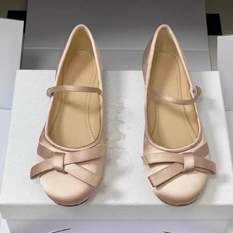 Nude pink satin mary jane ballet flats with bow detail