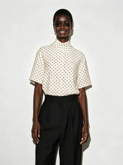 Polka dot mock neck short sleeve top front view