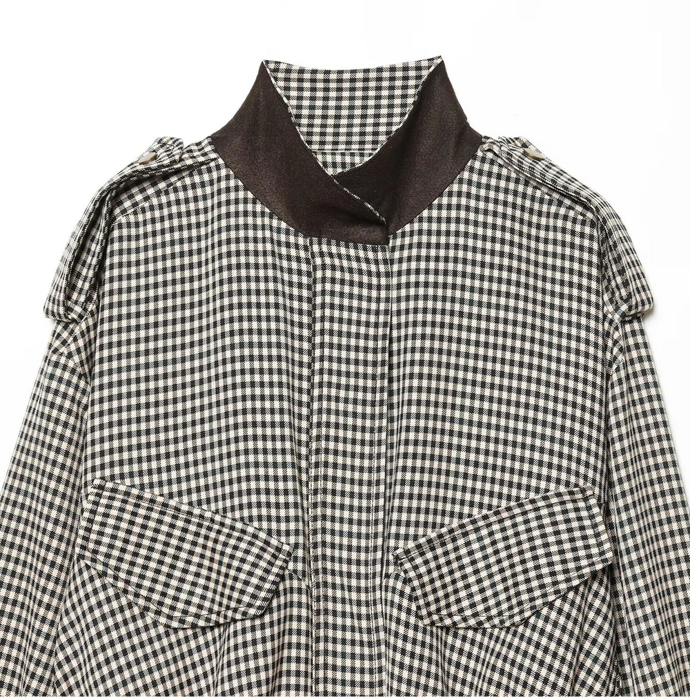 Black and white checkered shirt with a brown collar on a white background