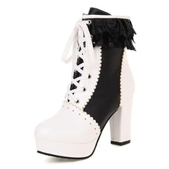 Black and white platform boot with lace-up design on a white background