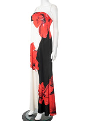 Mannequin wearing a black dress with red floral patterns