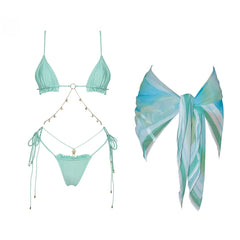 Mint green bikini with gold chain detailing and a colorful striped scarf