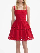 Red lace dress on a white background