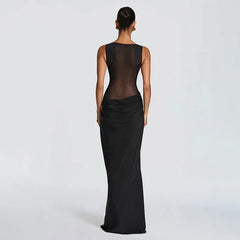Black evening gown with sheer back on a white background