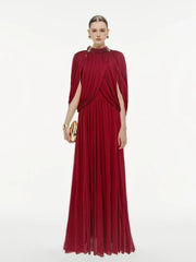 Woman wearing a red evening gown on a white background