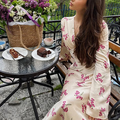 The back view of the dress, showing the flowing A-line silhouette.