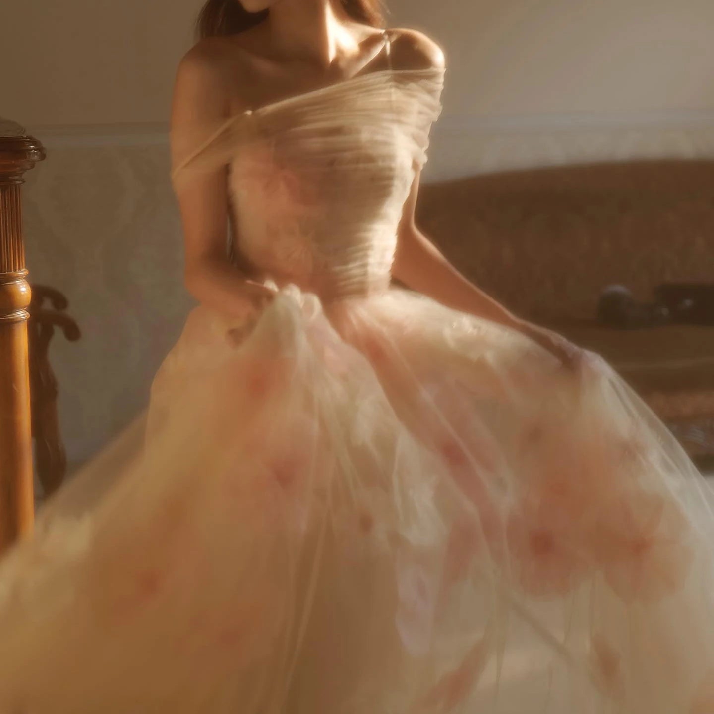 An elegant A-line formal dress with a sweetheart neckline and off-shoulder straps.