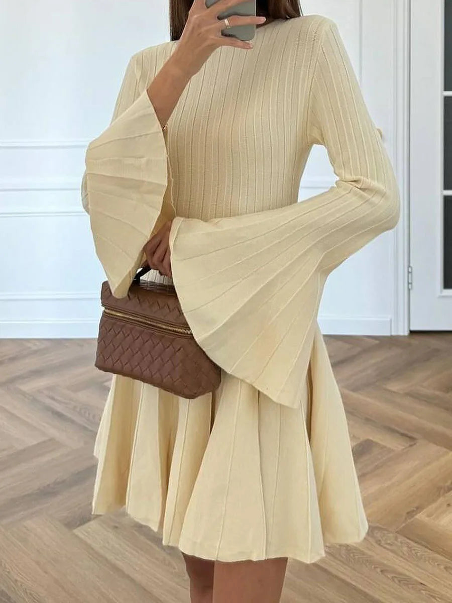 A-line mini dress in yellow with bell sleeves styled for elegant brunch or daytime events