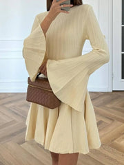 A-line mini dress in yellow with bell sleeves styled for elegant brunch or daytime events