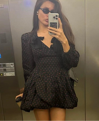 A-line v neck spotted mini dress for women shown in modern day outfit