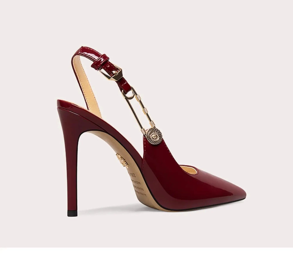 Adjustable metal buckle slingback pump in maroon for women’s formal looks on a light gray background