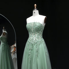 Strapless prom gown with built-in support and airy tulle volume