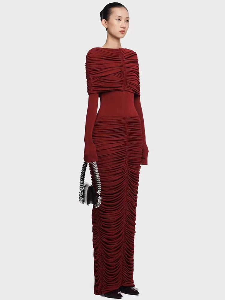 Close view of gathered pleat texture across the bodice and skirt