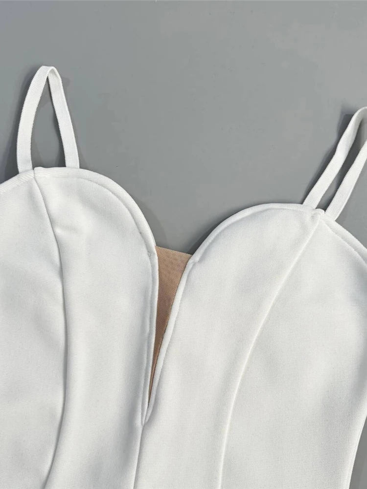 White strappy top on a gray background