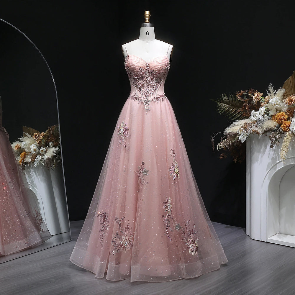 V-neck tulle A-line gown with appliqué detailing and slim straps