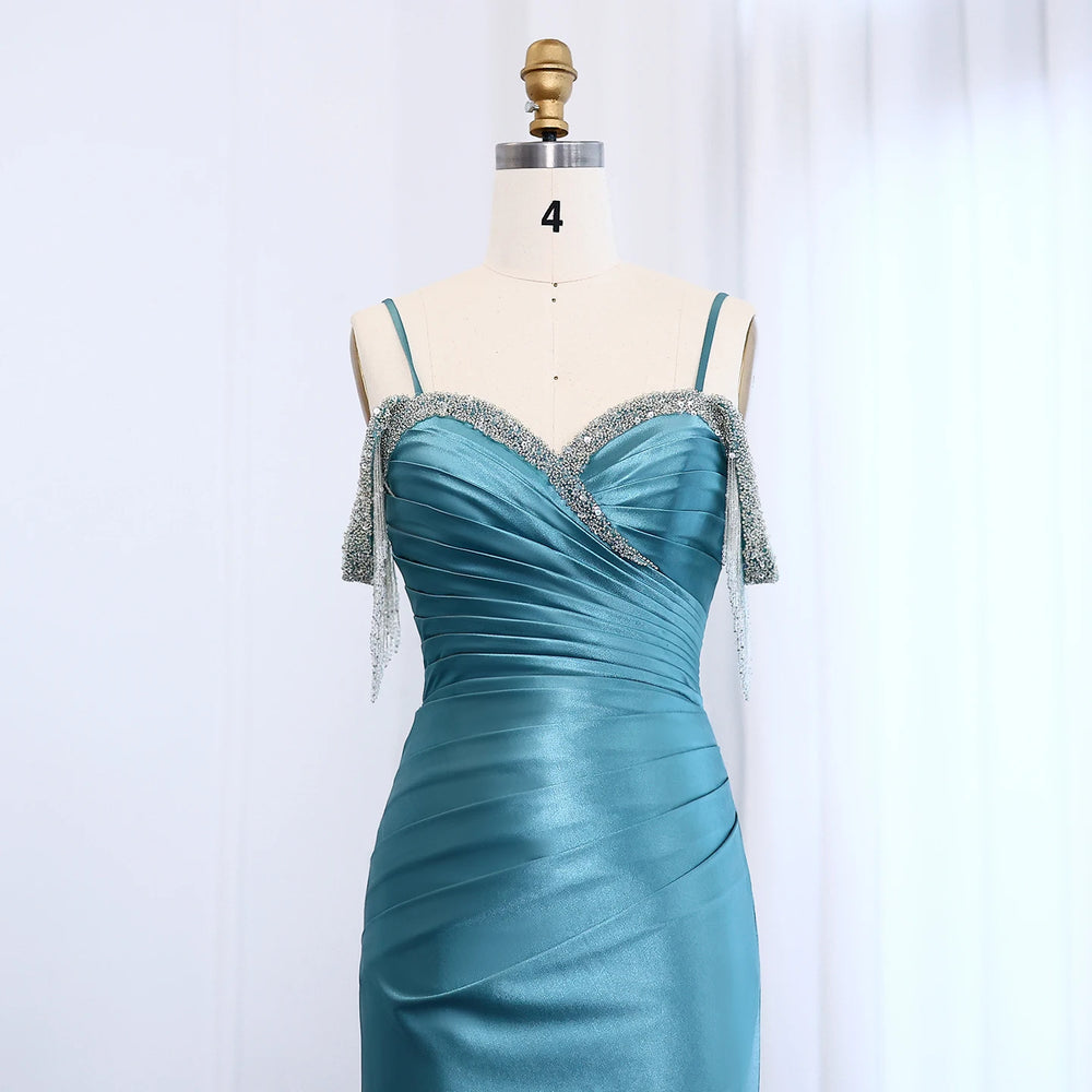 Close-up of sweetheart bodice with tassel and subtle sequined detail