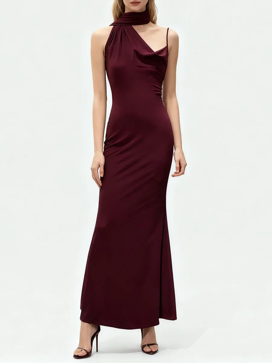 An evening sheath dress, highlighting sculpted waist shaping, fitted posture, and refined back zipper line.