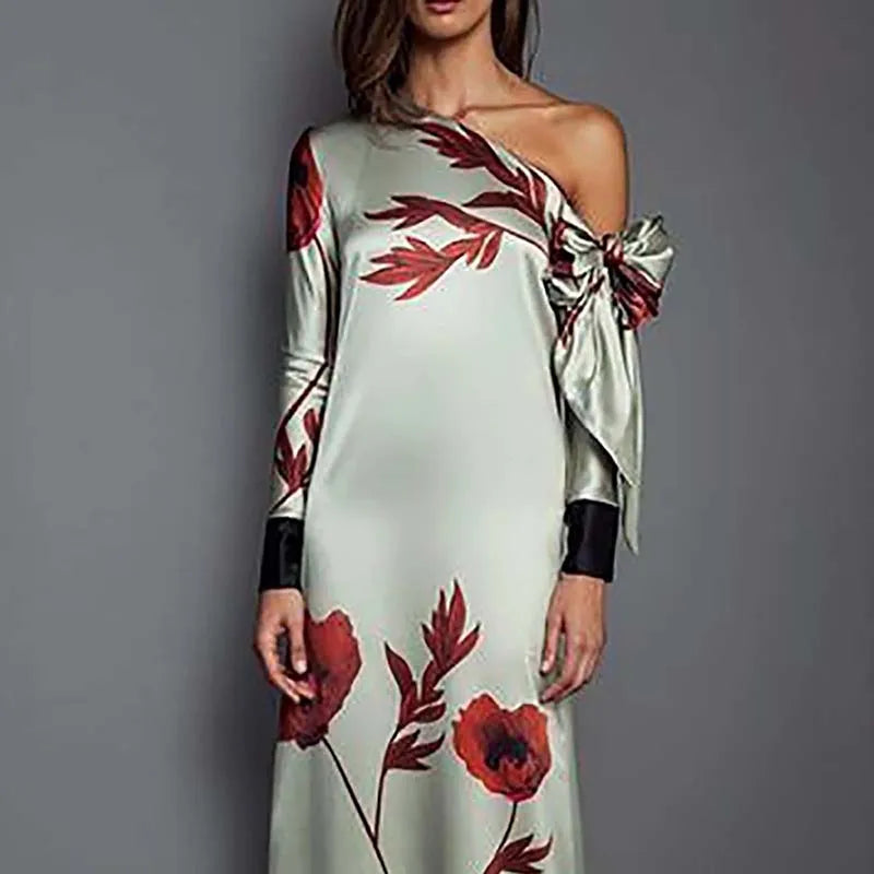 Autumn maxi dress with floral print and sculptural sleeve