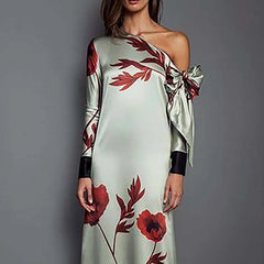 Autumn maxi dress with floral print and sculptural sleeve