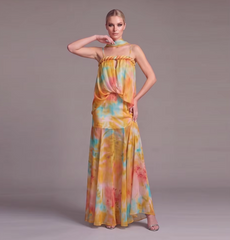 Model wearing a tie-dye maxi dress