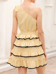 Flirty yellow dress with cinched waist and contrast hem detail  back-viewon a white background