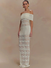 Woman wearing a backless crochet-style party dress styled for fall evenings against a beige background