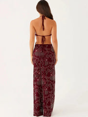 Backless burgundy gown with sparkling finish and ankle length