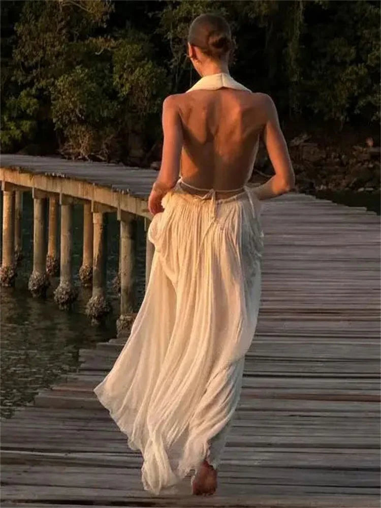 Elegant two-piece vacation outfit with pleated maxi skirt