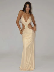 Gold deep-V evening gown displayed with elegant slim silhouette.