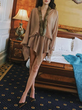 Beige faux fur collar mini dress styled for chic evenings