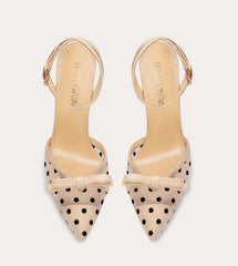 Beige polka dot bow heels for playful event styling