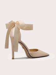 Beige silk ribbon-tie platform heels with oversized ankle bow